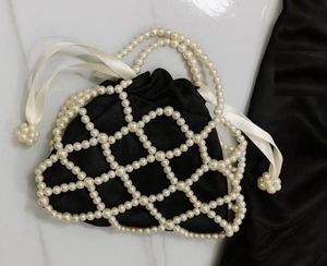 pearl polo black &amp; white bag