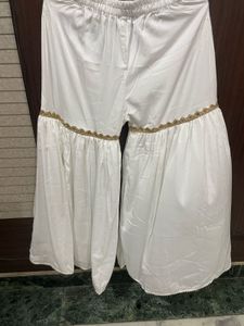 Elegant White Palazzo Pants with Gold Trim