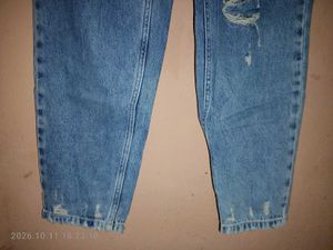 Distressed Blue Denim Jeans