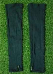 Dark green Arm Sleeves for tan protection.