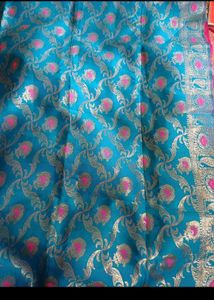 Elegant Teal Saree with Gold & Pink Motifs