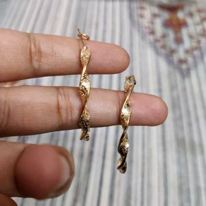 Gold Twisted Drop Earrings
