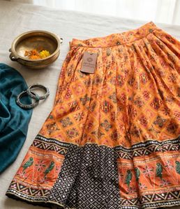 Vibrant Orange Printed semistich Lehenga Choli Set
