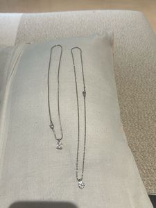 Two dainty diamond necklaces