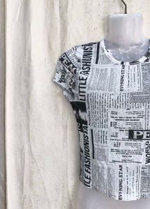 Newspaper Print Mesh Crop Top