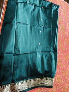 Elegant Teal Saree with Intricate silver Weave