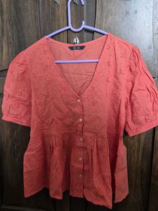 Coral Eyelet Peplum Top