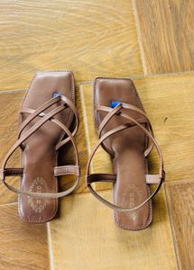 Brown strappy flat sandals