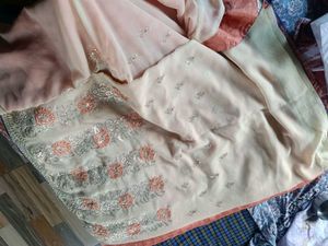 Orange Cream saree with blouse and peticoat