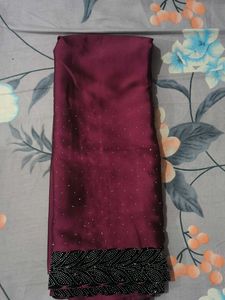 Elegant Maroon Saree with Embellishments