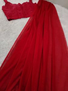 Vibrant Red Saree with Matching Corset Blouse