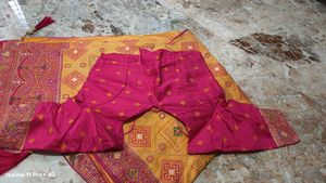 Vibrant Yellow Saree with Pink Blouse