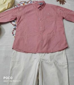 Men's Pink Button-Down Shirt with jeans