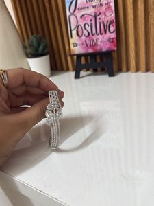 Elegant Silver Bangle Bracelet with Crystals
