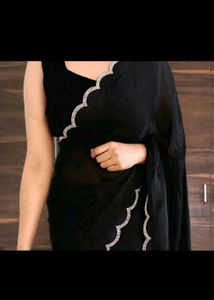 Elegant Black Saree with Scalloped Edges