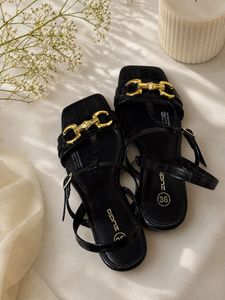 Stylish Black Sandals with Gold Buckle