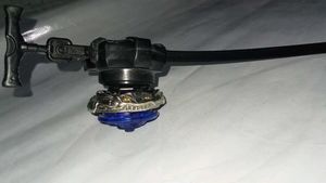 Rago Metal Diablo Nemesis beyblade with launcher