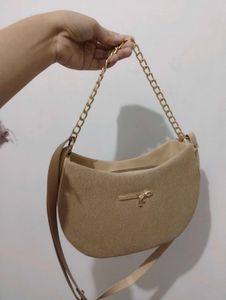 Stylish Beige Hobo Bag with Gold Chain
