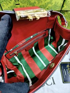 GUCCI* *PADLOCK BAG FEATURING THE ICONIC GG