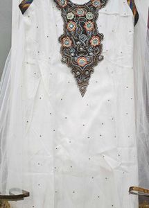 Elegant White Kurta Set with Embellished Neckline