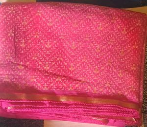 Vibrant Pink Saree with Gold Print
