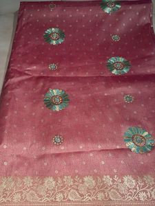 Elegant Pink Saree with Floral Motifs