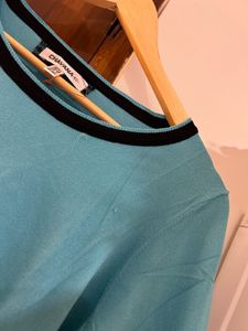 Aqua Blue Knit Top with Black Accents