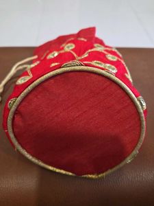 Red Potli Bag with Gold Embellishments