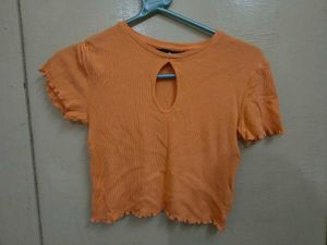 Orange Ribbed Cut-Out Cropped Top