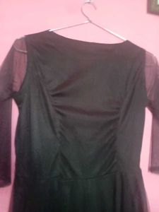 Elegant Black Dress with Sheer Sleeves
