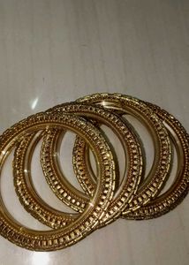 Elegant Gold Bangles with Embellishments