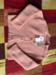 Pink Cardigan with Black Bow Accent