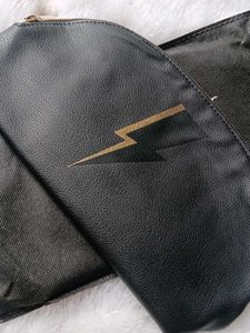 Carolina Herrera Black Clutch with Gold Lightning