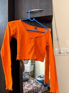 Orange Lettuce Hem Crop Top