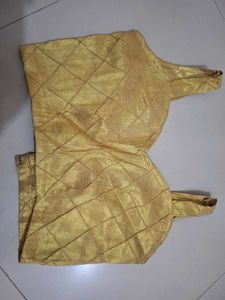 Elegant Gold Quilted Blouse