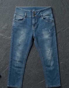 Distressed Blue Denim Jeans