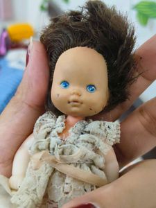 Vintage Doll with Brown Hair and Blue Eyes