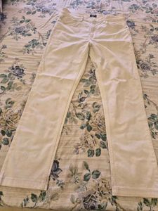 Cream Wrangler Jeans