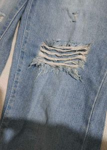 Distressed Blue Jeans