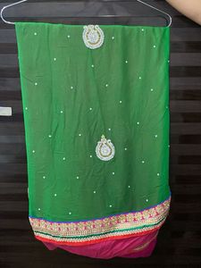 Elegant Heavy Green And Pink Embellished Saree
