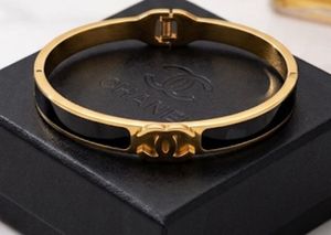 Elegant Gold &amp; Black Bangle Bracelet