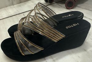 Stylish Black and Gold Flat Sandals
