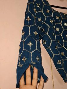 Stunning Teal lengha choli with Silver Embellishme
