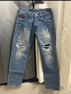 Supreme Distressed Blue Jeans