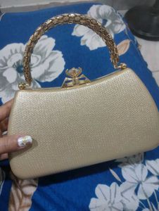 Elegant Gold Clutch Bag with Chain Strap