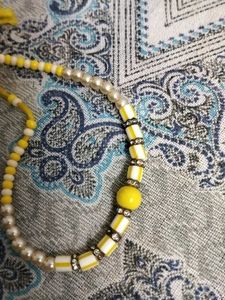 Traditional yellow Tibetan khata scarf