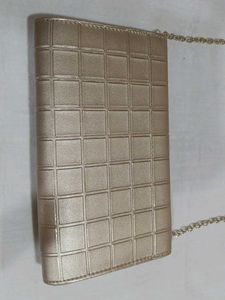 Mochi Gold Textured Clutch Bag