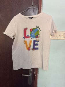 White T-Shirt with "Love" Earth Graphic