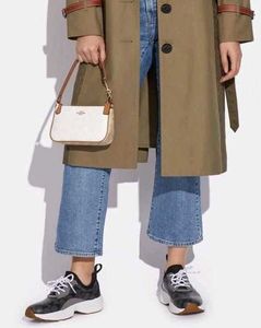 COACH NOLITA DAISY APPLIQUE BAG, FEATURE WITH A PE