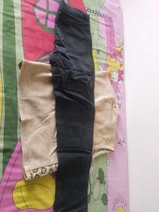 Stylish Black Jeans and cream vest